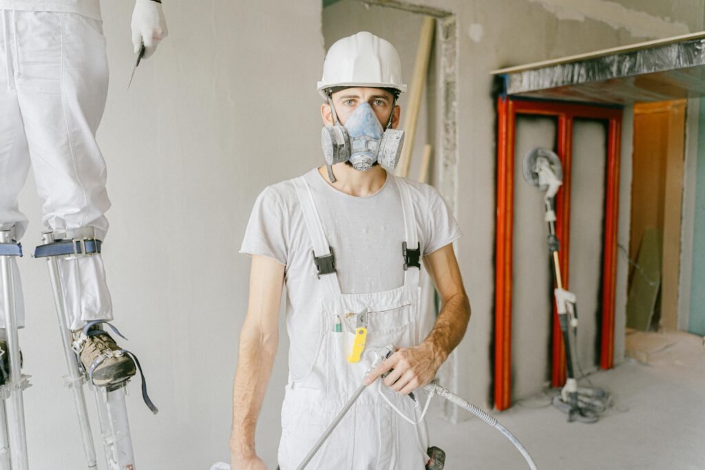 Odor Removal FAQ 7 Restoration workers restoring a room