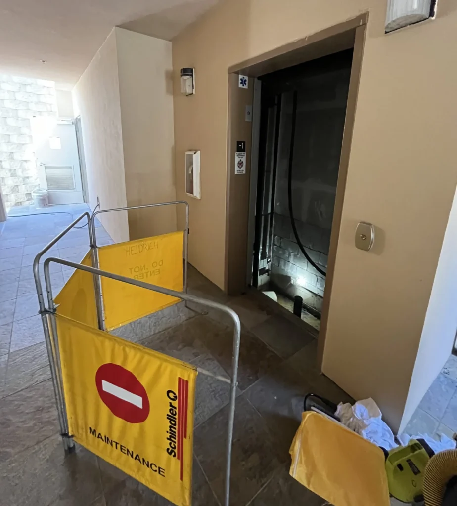 Sewer Damage Cleanup Burbank | Hazmat & Biohazard Removal 1 A blocked-off elevator shaft that has flooded.