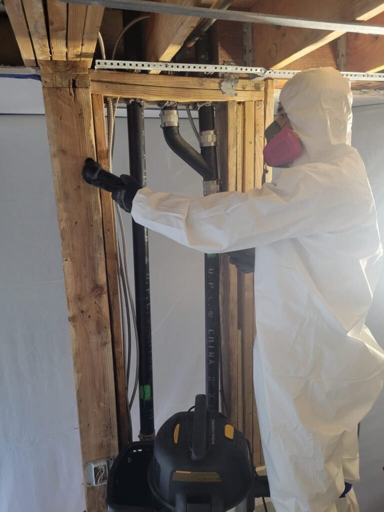North Hollywood Damage Restoration Services | Onsite Pro 19 HEPA Vacuuming exposed framing