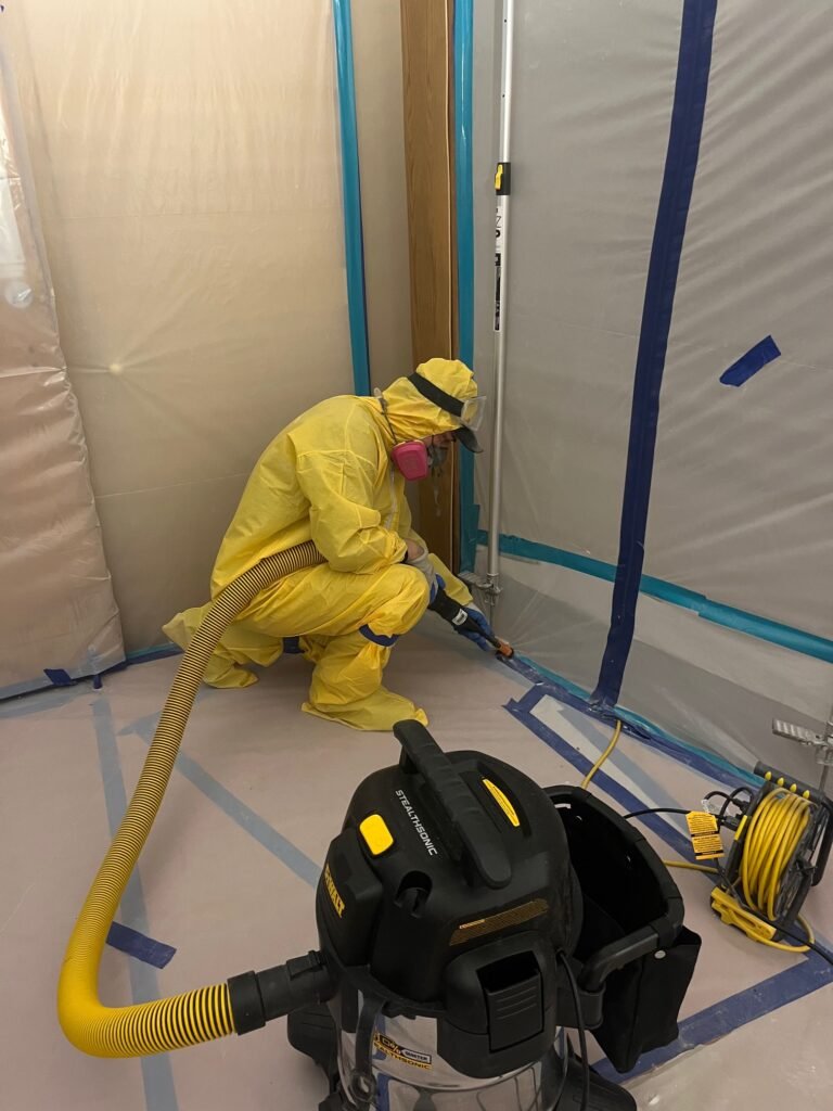 North Hollywood Damage Restoration Services | Onsite Pro 29 HEPA Vacuuming inside contained area
